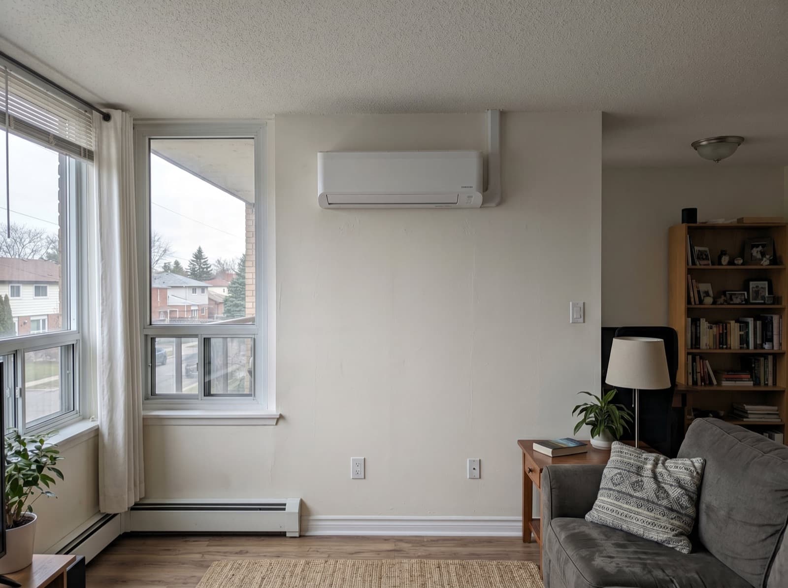 Ductless wall unit in a finished living room.